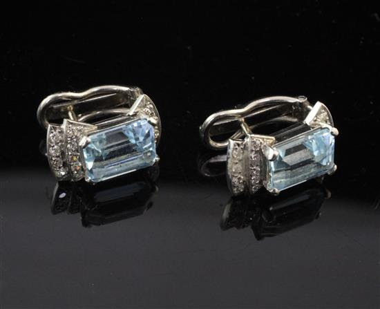 A pair of white gold, aquamarine and diamond earrings, approx. 0.5in.